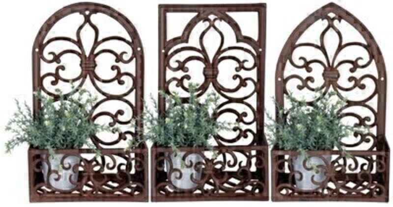 <p>Metal Window Frame & Planter from Fallen Fruits. Cast iron window frame planter - available in rectangle half round and gothic shapes. Set of Three. Dimensions 27.9 x 14.2 x 44.4 cm</p>